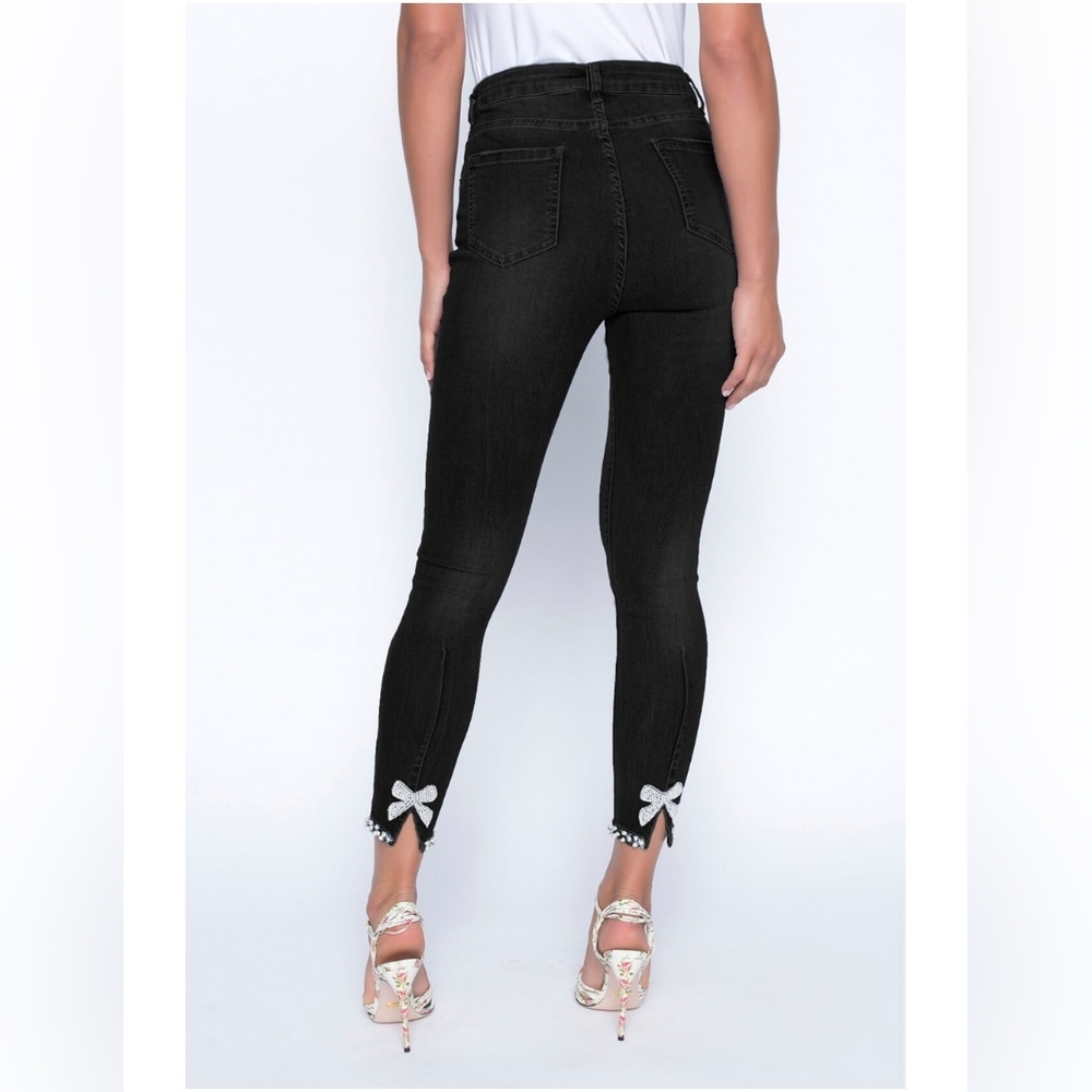 Frank Lyman Black slim leg jean with pearl bow detail at the back hemline Size L - Picture 1 of 8